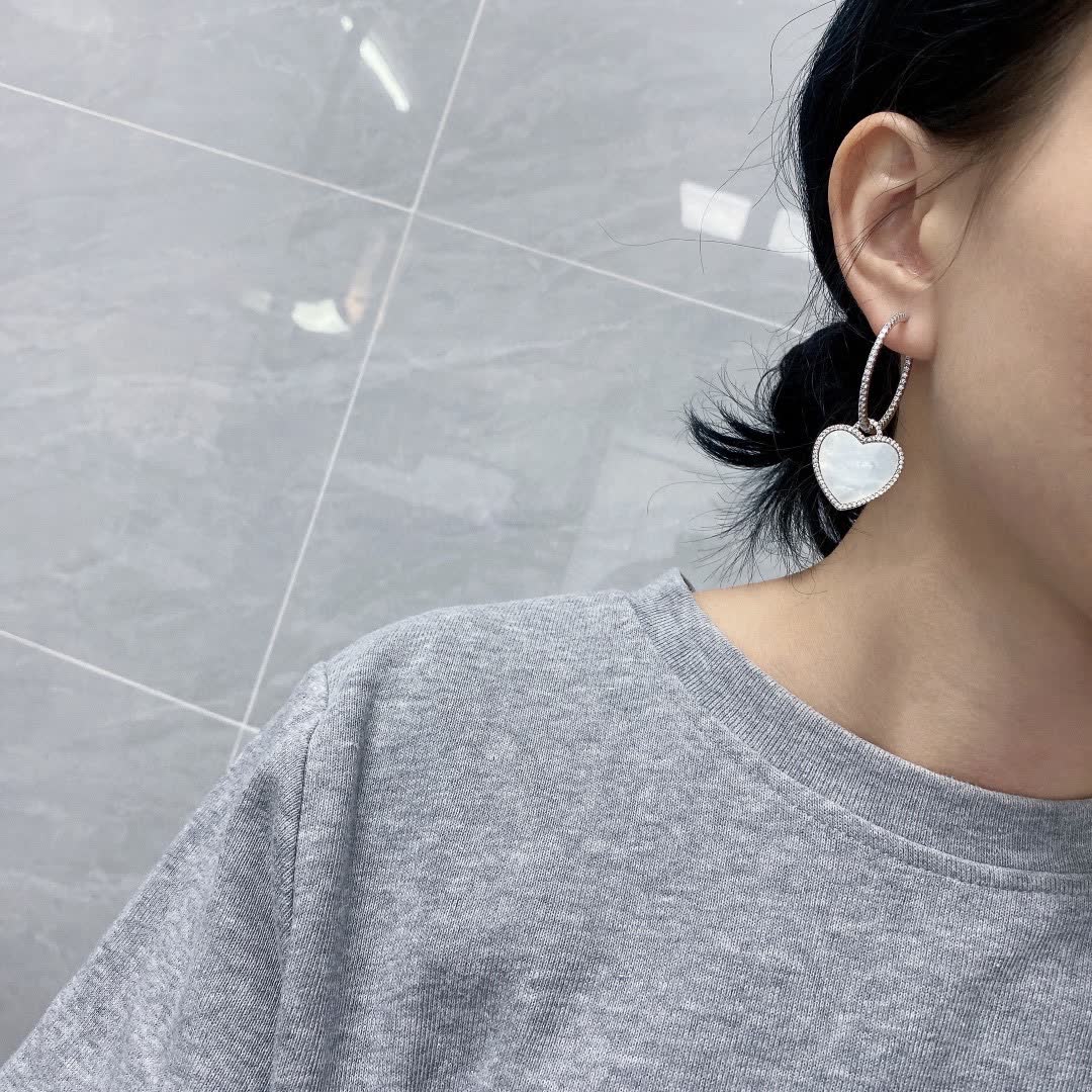 APM Monaco Elegant Heart-Shaped Hoop Earrings with Diamond Accents